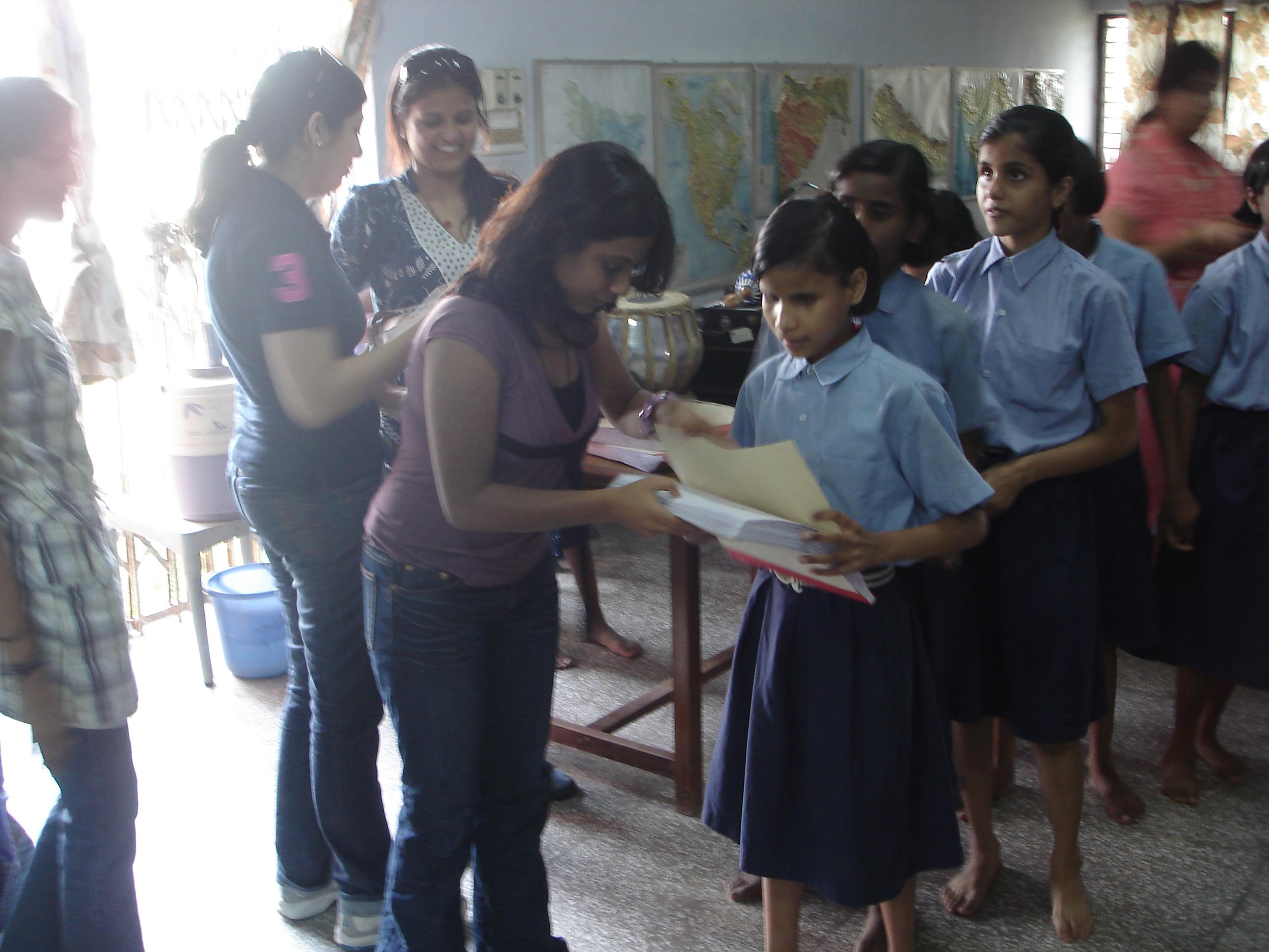 Friends of Sapney distributing Brailee books at AICB, gurgaon